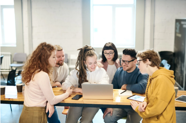 employees discussing ways to market a business