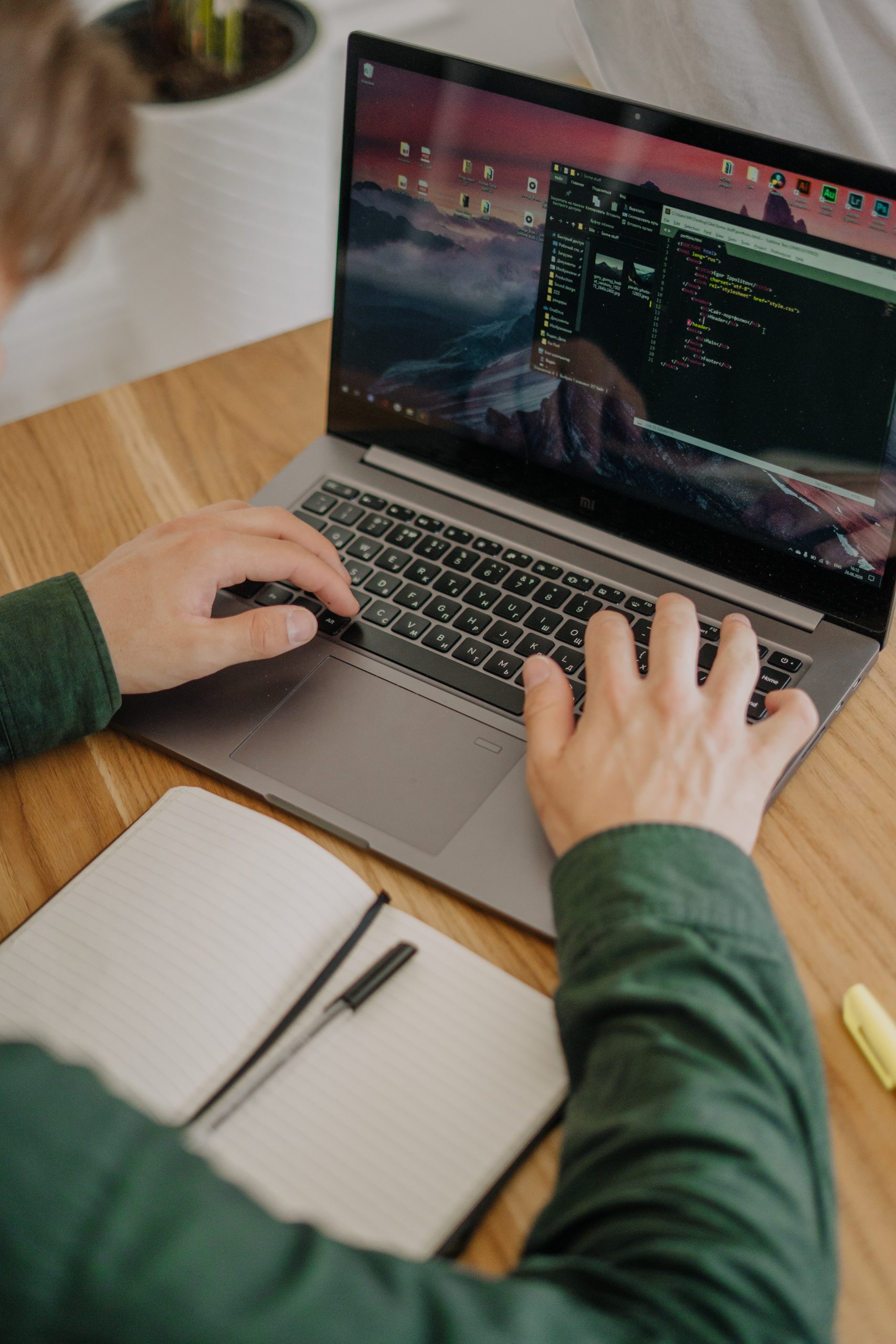 using-a-laptop-on-a-wooden-desk