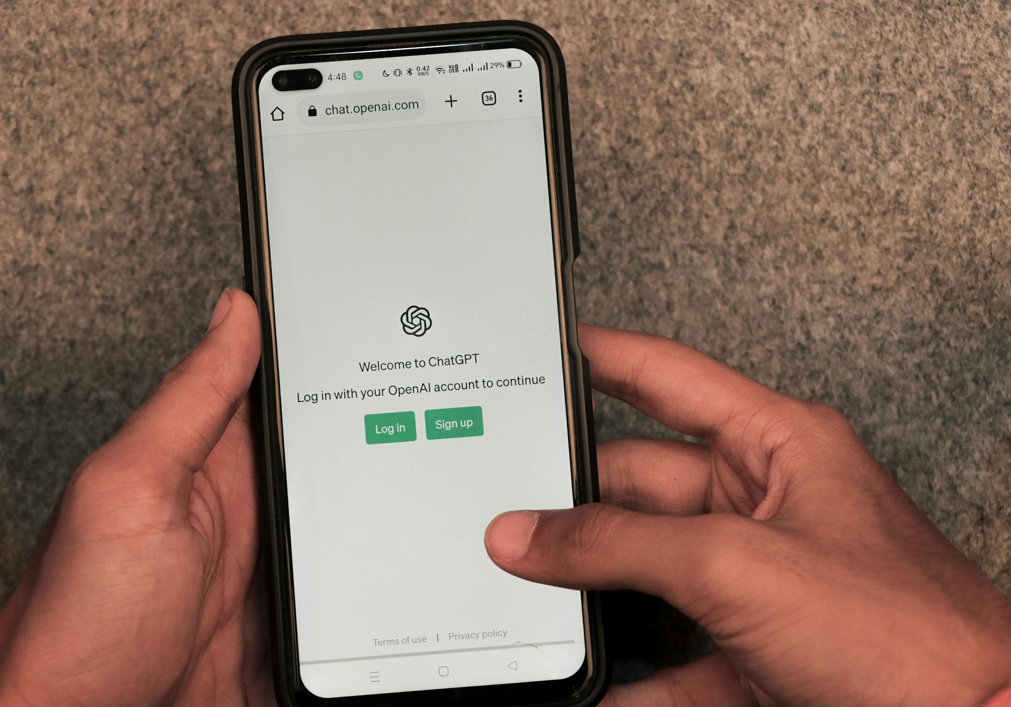 Maximizing Your Blog’s Reach: SEO Tips for Bloggers 1 close up of hands using smartphone with chatgpt
